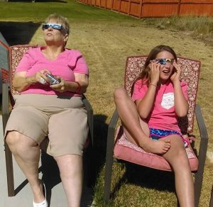 Karen and Grandaughter watching eclipse